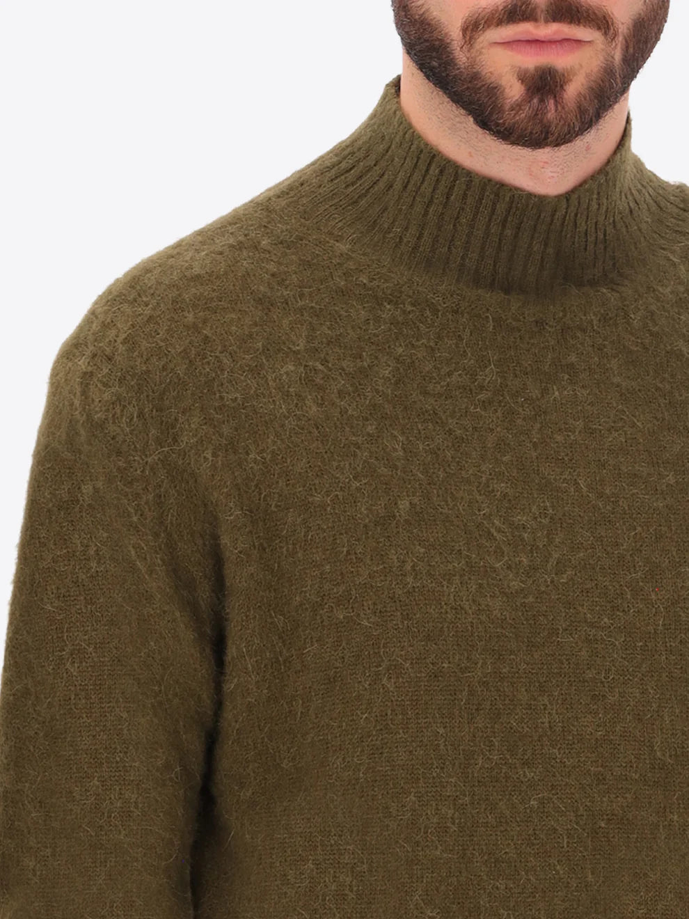 Male model wearing high neck alpaca blend knitwear by distretto12 in green with close up view