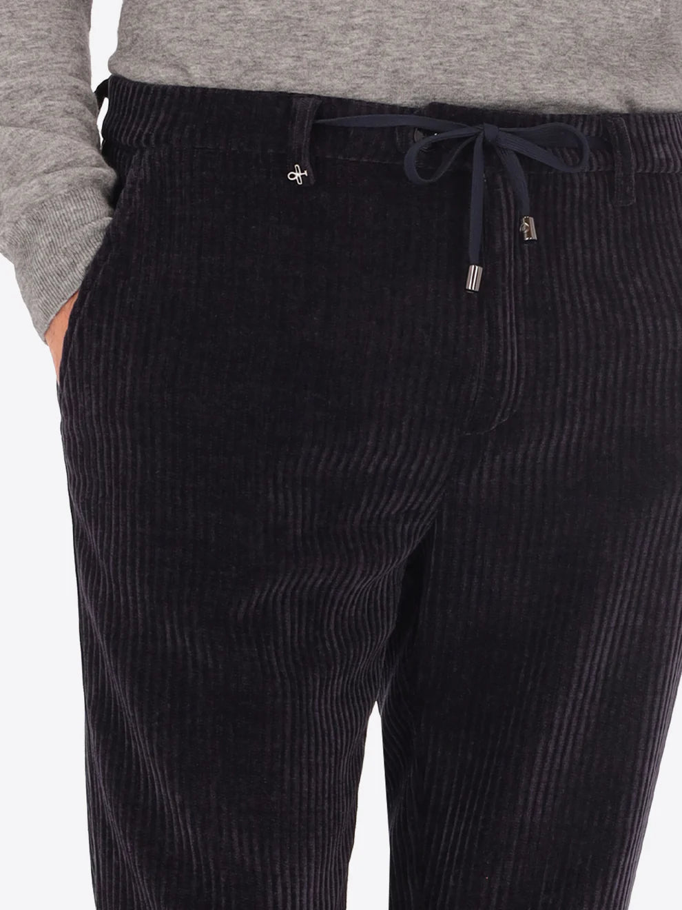 Navy corduroy style Distretto12 trousers on a male model with drawstring shown