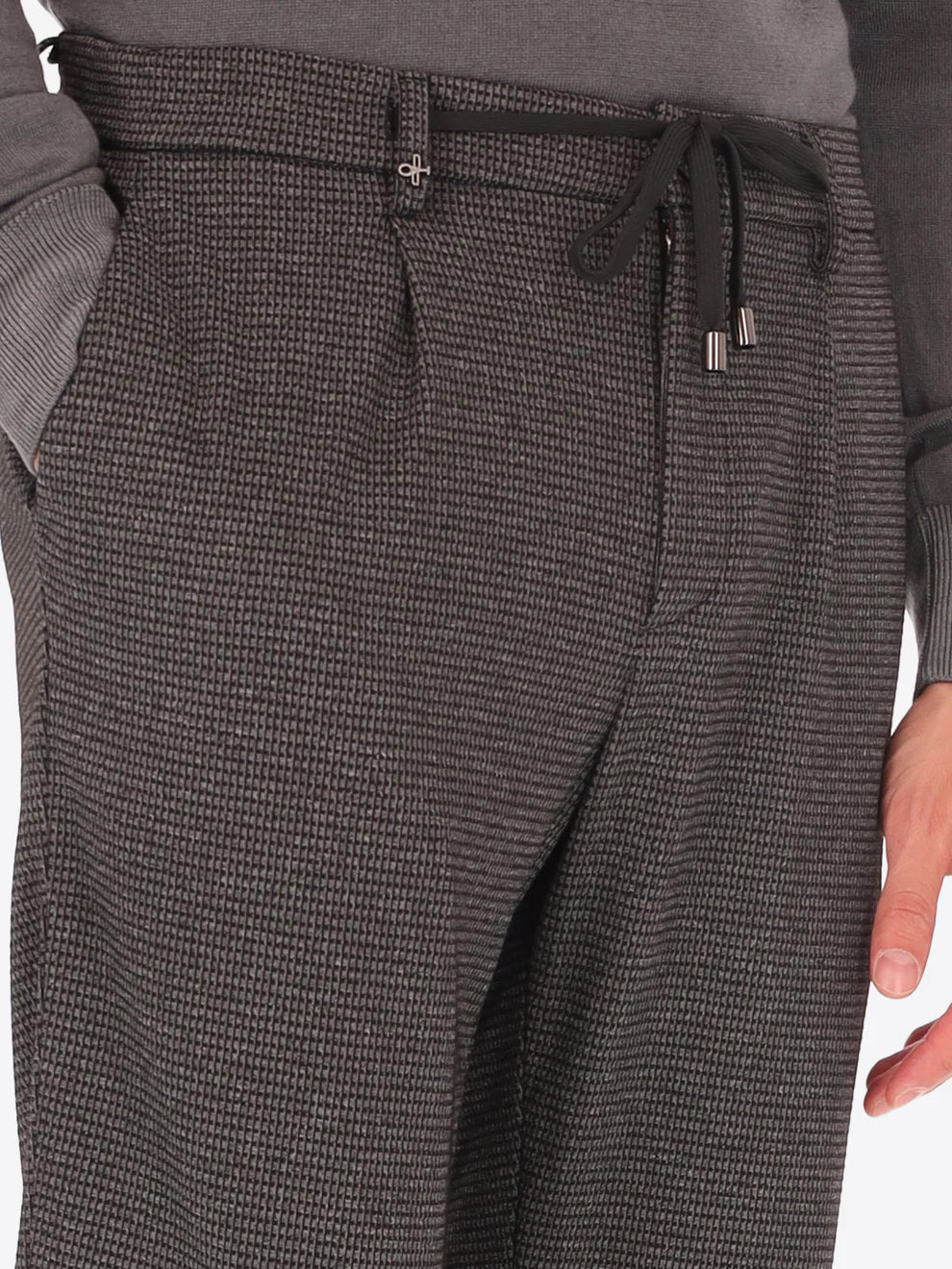 Grey Distretto12 trousers with micro check pattern on a male model with drawstring shown