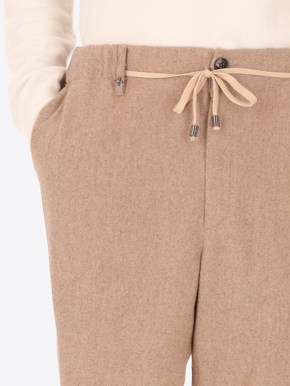 Beige Wool Blend Distretto12 trousers on a male model with the drawstring closed