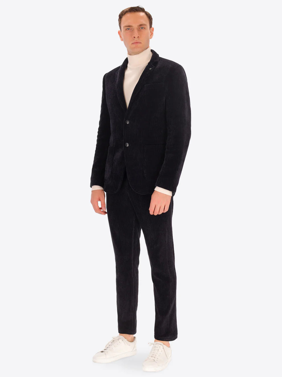 Male model wearing corduroy suit by distretto12 in navy