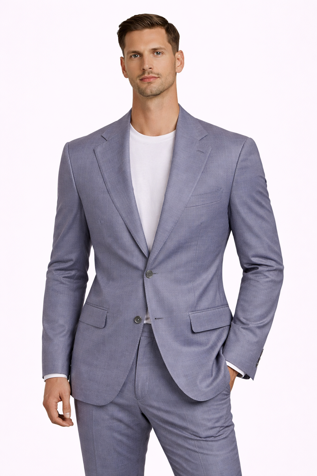 A model wearing a blue grey cotton suit from RPL 