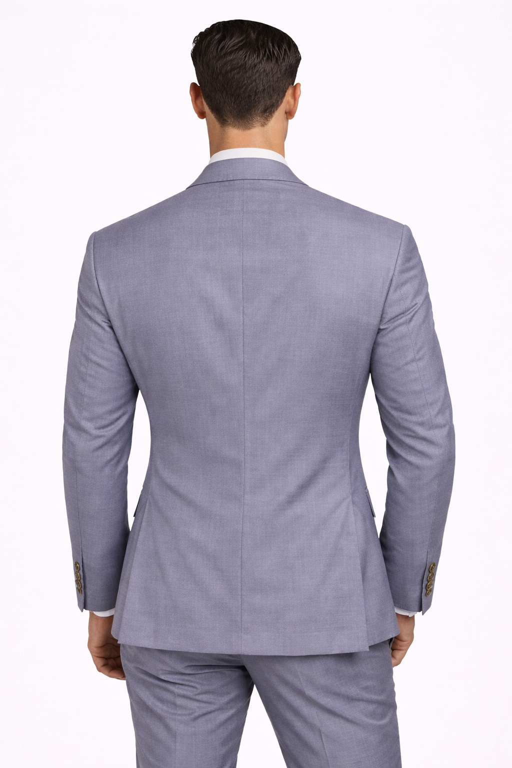 A model wearing a blue grey cotton suit from RPL from behind