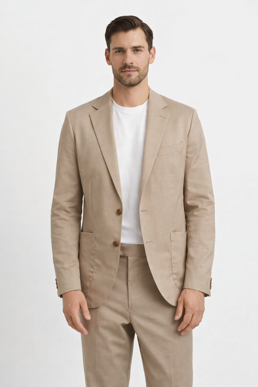 A model wearing a cotton blend suit from RPL in beige