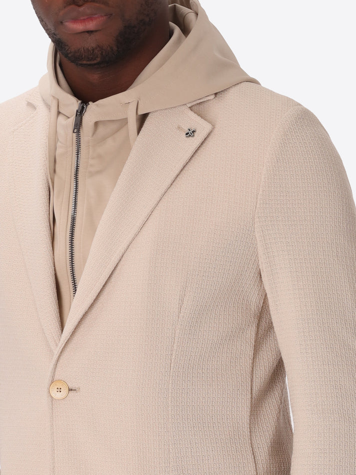 A picture of a model wearing Distretto 12 Jacket Rufino with hood close up