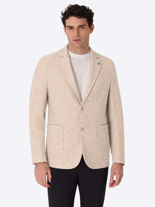 A model wearing Distretto12 Jacket Cedro knitted blazer