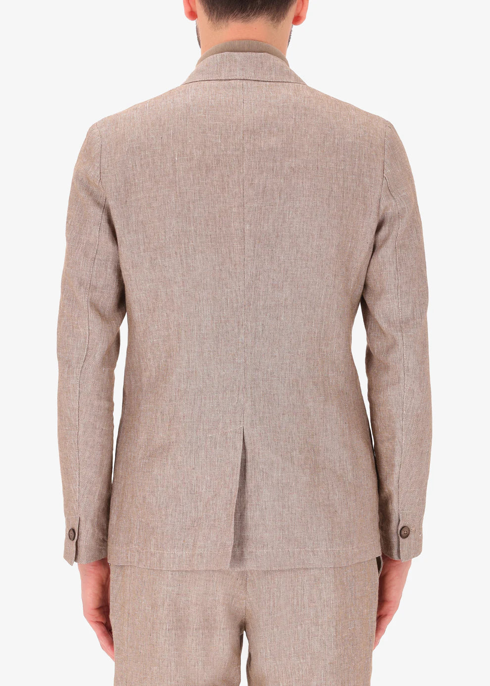 A rear facing picture of a model wearing a linen double breasted blazer from Distretto 12.