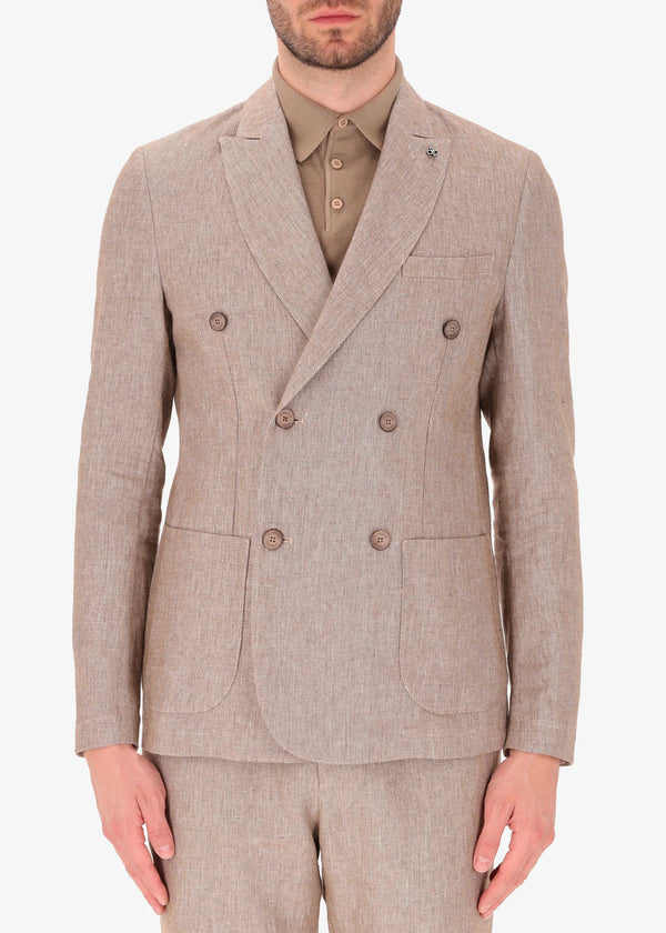 A front facing picture of a model wearing a linen double breasted blazer from Distretto 12.