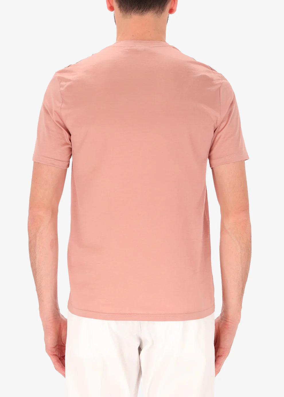 A back facing image of a model wearing Distretto 12 T-Shirt Scot in pink.