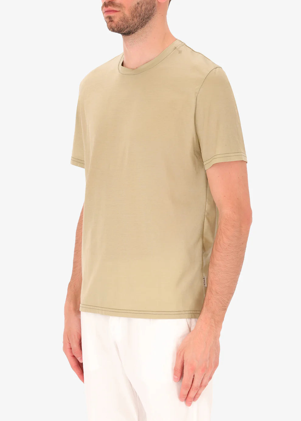 A side facing image of a model wearing Distretto 12 T-Shirt Scot in sage.