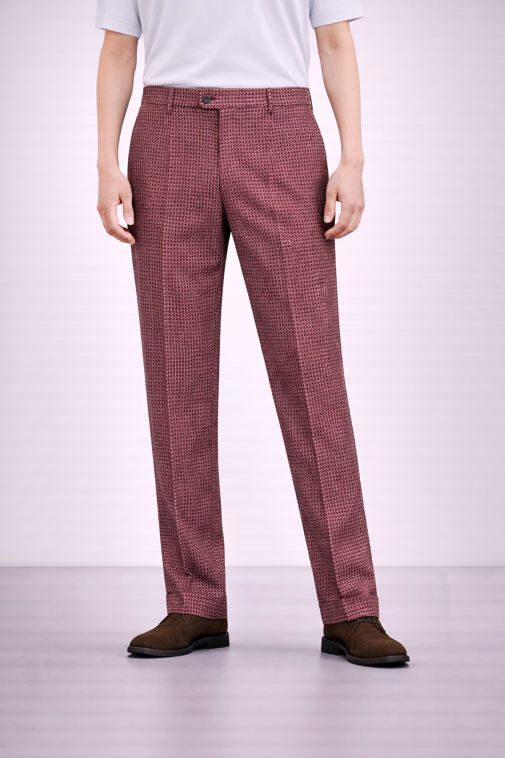 A model wearing Germano 1952 maroon corduroy trousers.