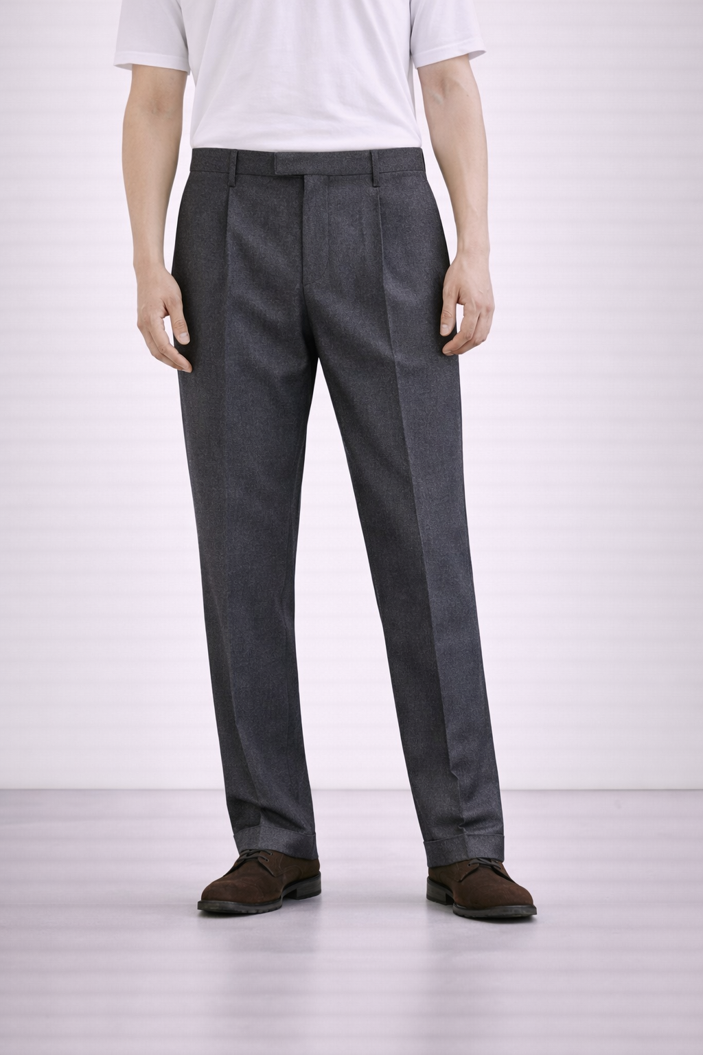 A model wearing Germano 1952 charcoal grey trousers double pleat.