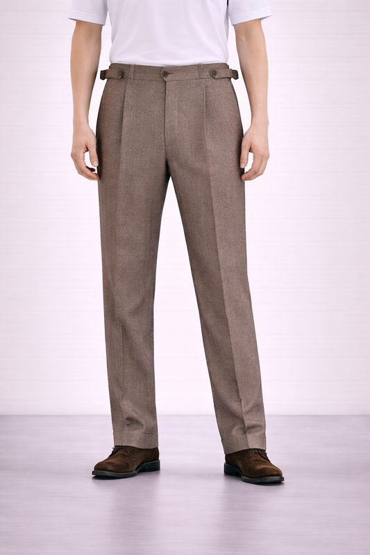 An image of a model wearing Germano 1952 ghurka trousers with double pleat.