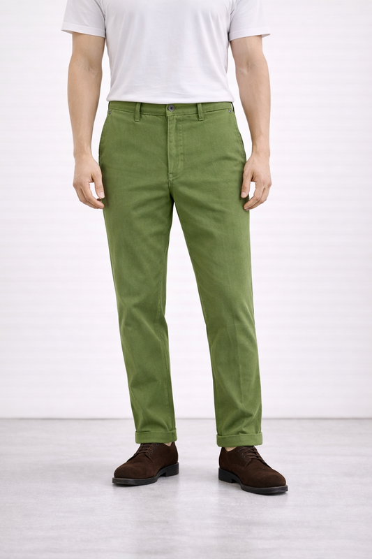 A model wearing Germano 1952 forest green chinos. 