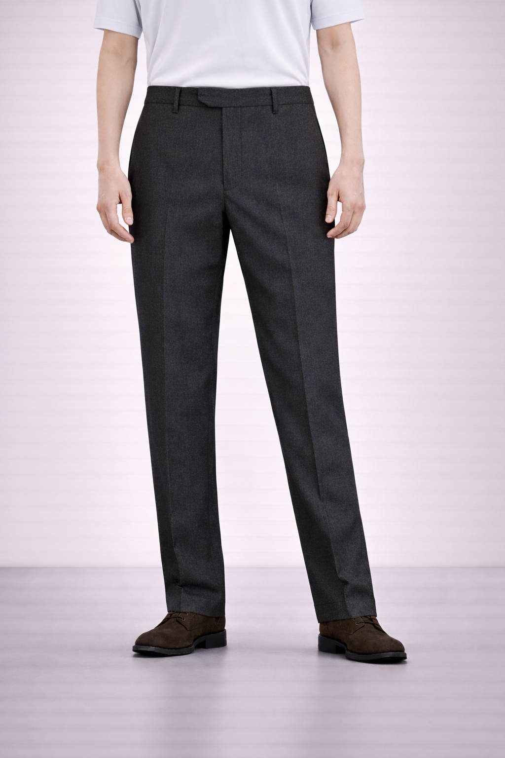 An image of a model wearing Germano 1952 charcoal trousers with slim fit and single pleat.