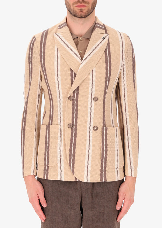 A front facing picture of a model wearing a striped knitted double breasted blazer from Distretto 12.