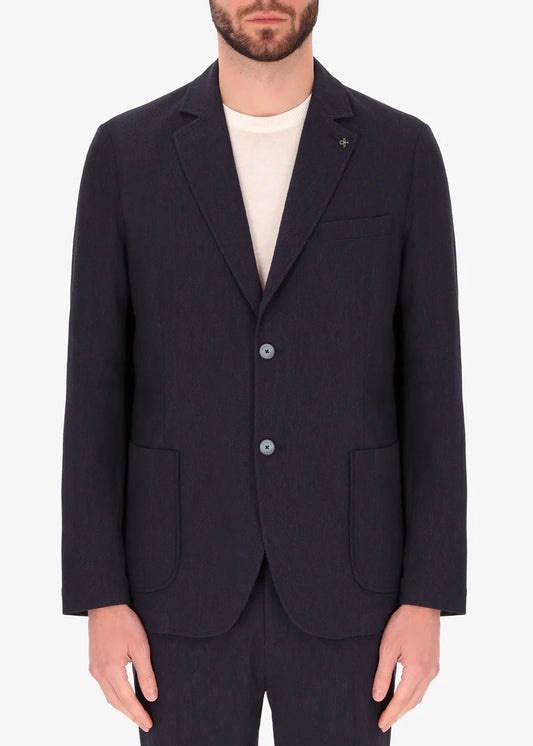 A front facing image of a model wearing Jacket Saul in blue from Distretto 12.