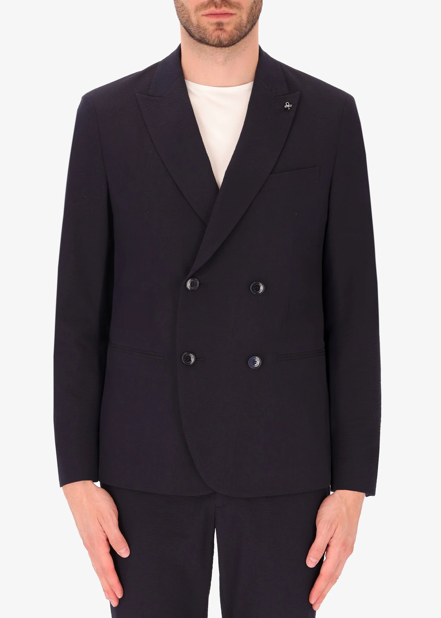 A front facing image of a model wearing Distretto 12 Tailoring tech  Double Breasted Jacket Arezzo.