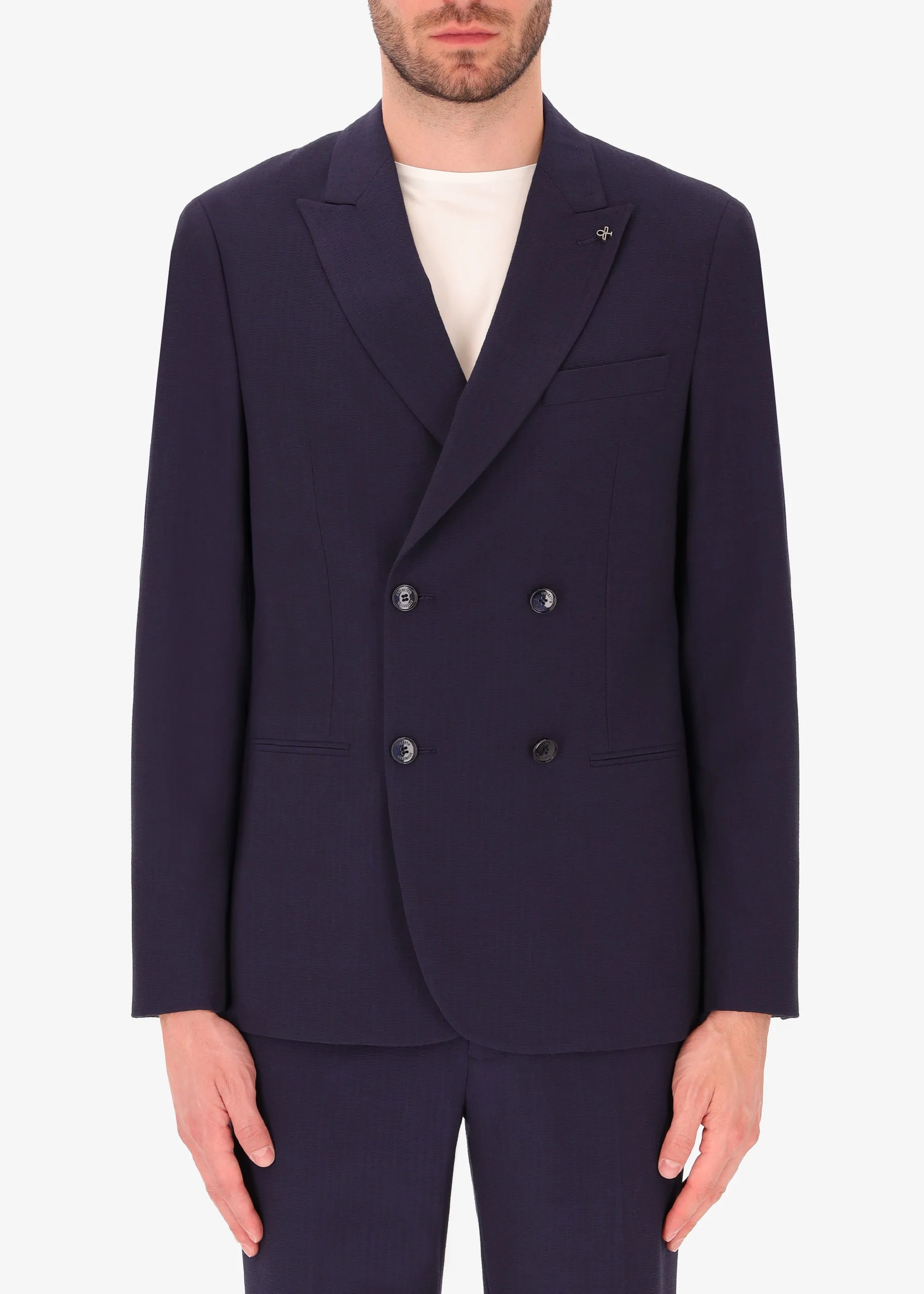 A front facing image of a model wearing Distretto 12 Double BreastedTailoring tech Firenze Jacket.